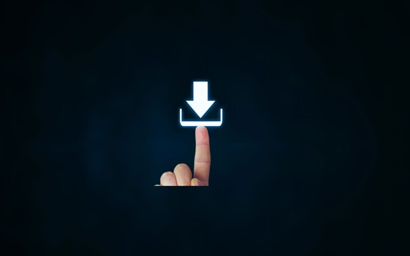 Finger pointing to a download sign