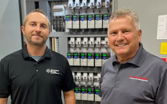 From left: Evan Pierce, Project Manager at Electrical Design and Motor Control (EDMCI), and Ralf Jung, Regional Sales Director at HELUKABEL. (Source: EDMCI)