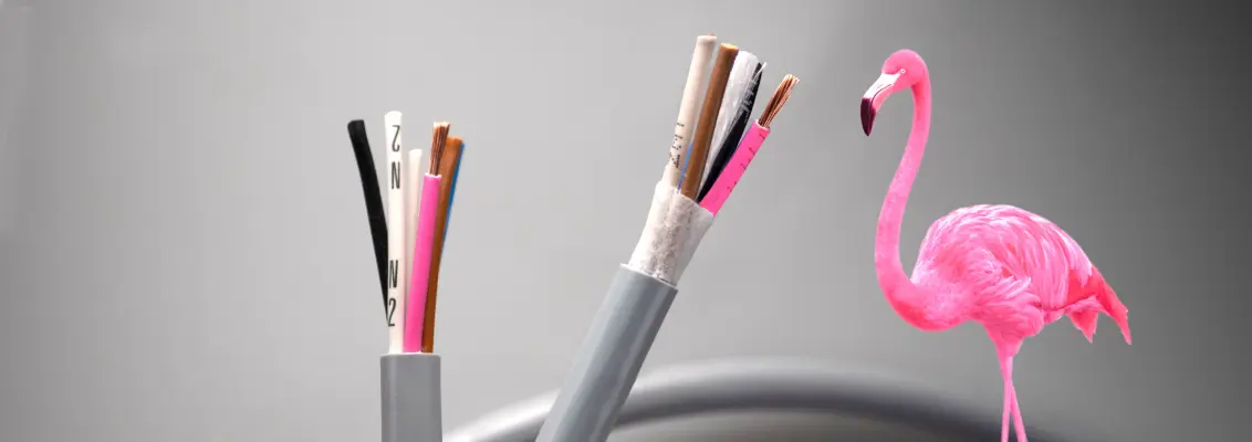 Cable with pink wire next to pink flamingo