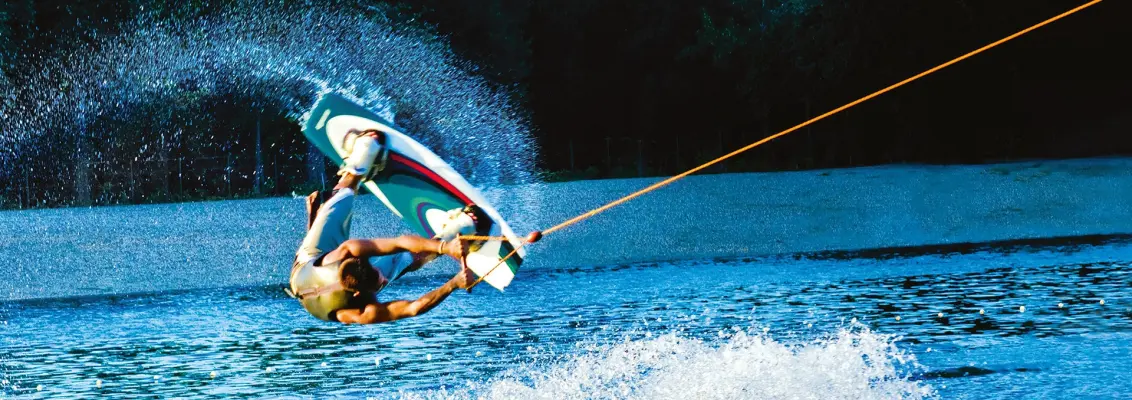 Wakeboarder does a flip